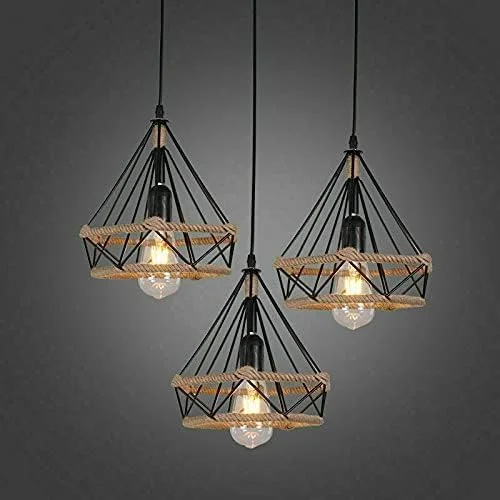 Black vintage industrial pendant light with three metal shades, white interiors, and hemp rope detailing hanging from ceiling rose