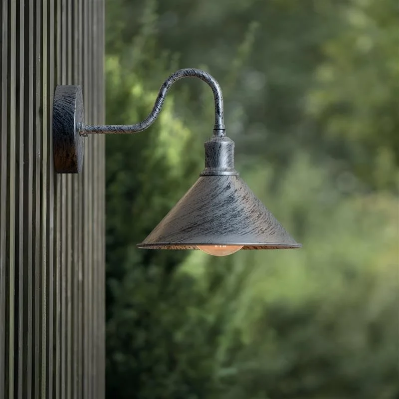 Vintage galvanized swan neck dimmable outdoor lamp with cone shade mounted on a wall, suitable for porch or garden lighting
