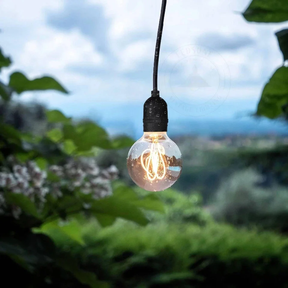 Vintage pendant light with metal E27 holder, PVC cable, and ceiling rose for adjustable hanging lighting fixture