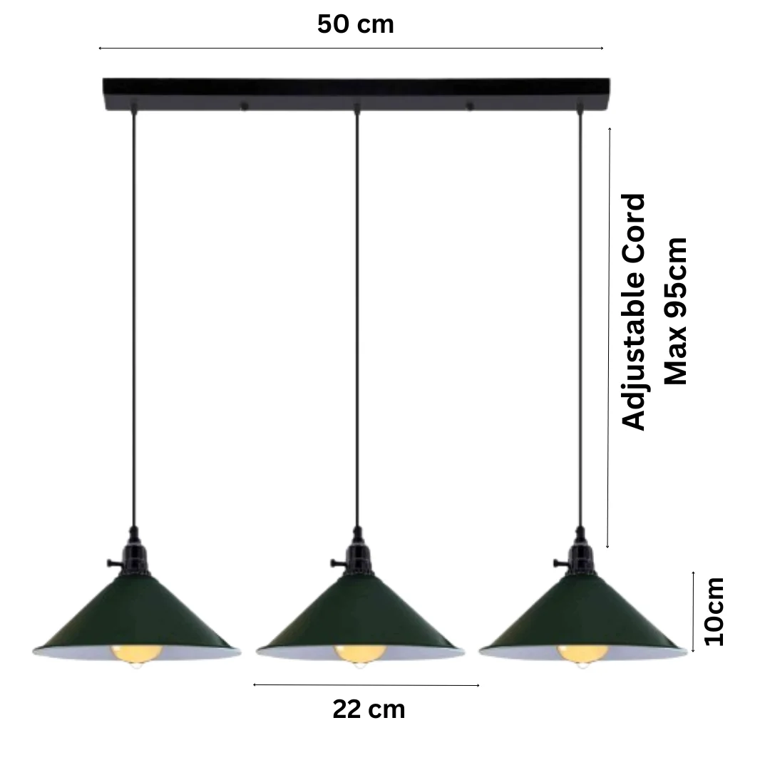 Three metal cone shades on adjustable cables forming a kitchen island pendant light with a vintage fluming switch