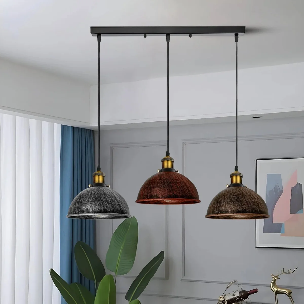 E27 pendant light with three adjustable vintage metal shades in rustic red, brushed copper, and brass finishes hanging from ceiling