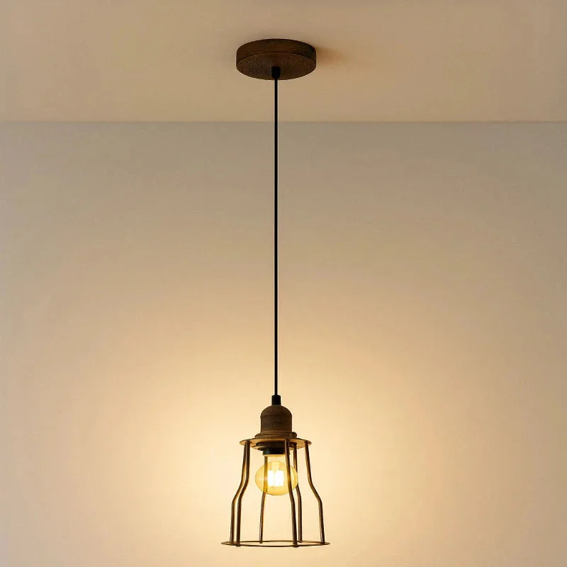 Three vintage ceiling pendant lights with open metal wire cage shades hanging from a rectangular ceiling plate