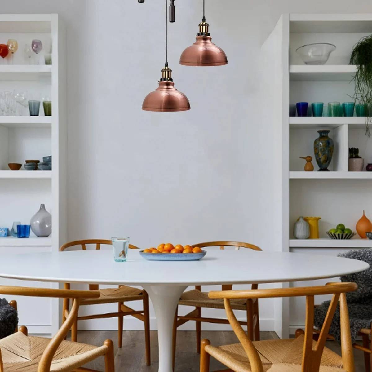 2 head ceiling pendant light with adjustable metal arms and black industrial finish hanging from ceiling