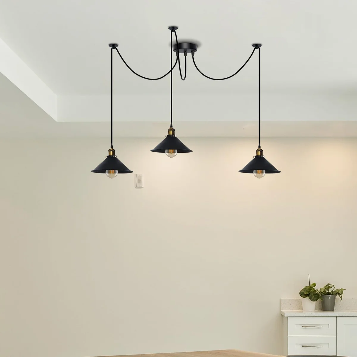 Black pendant lamp with six metal arms, E27 holders, and black shades hanging from ceiling mount