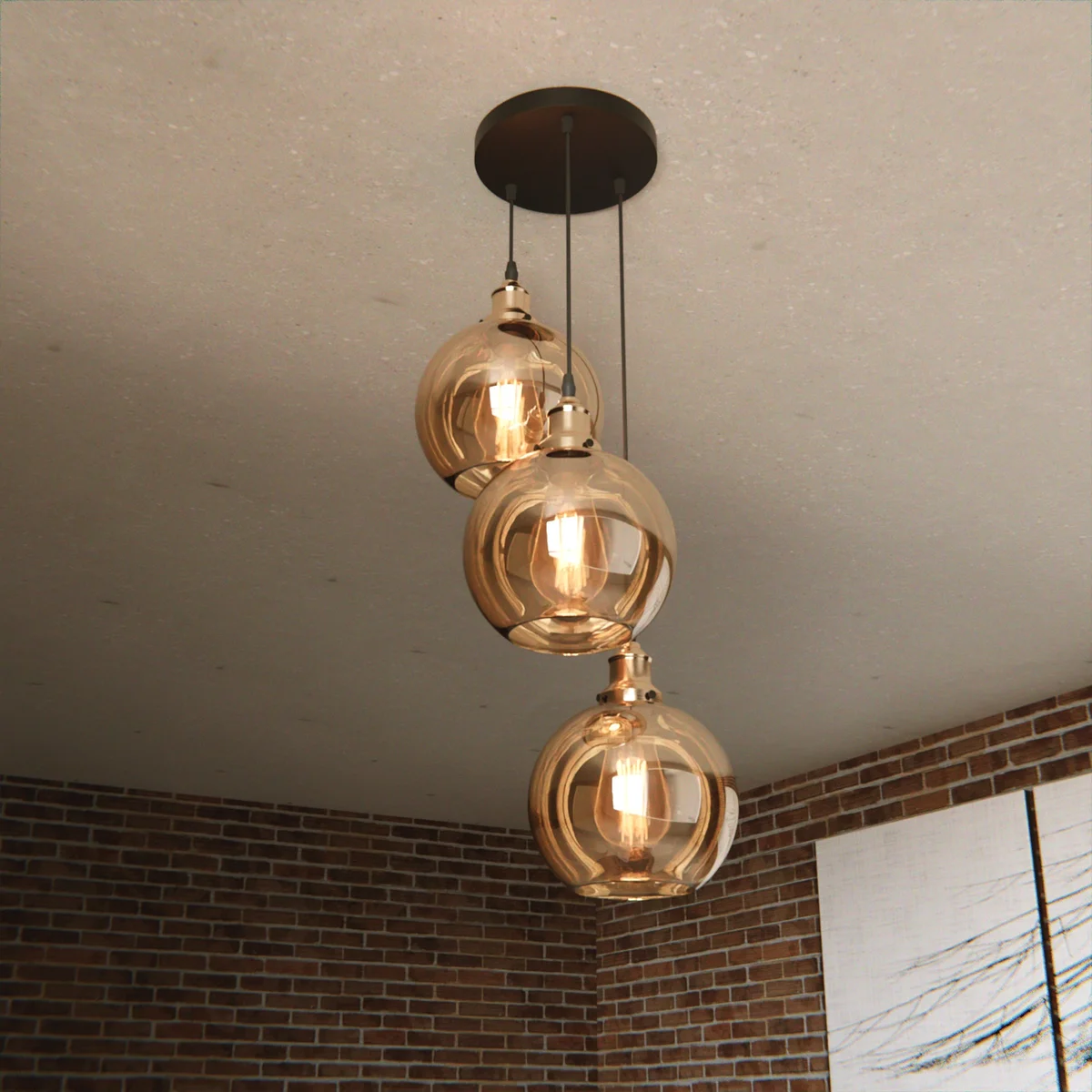 Industrial pendant light with three amber glass shades on a metal frame, adjustable hanging cables, suitable for ceiling mount.