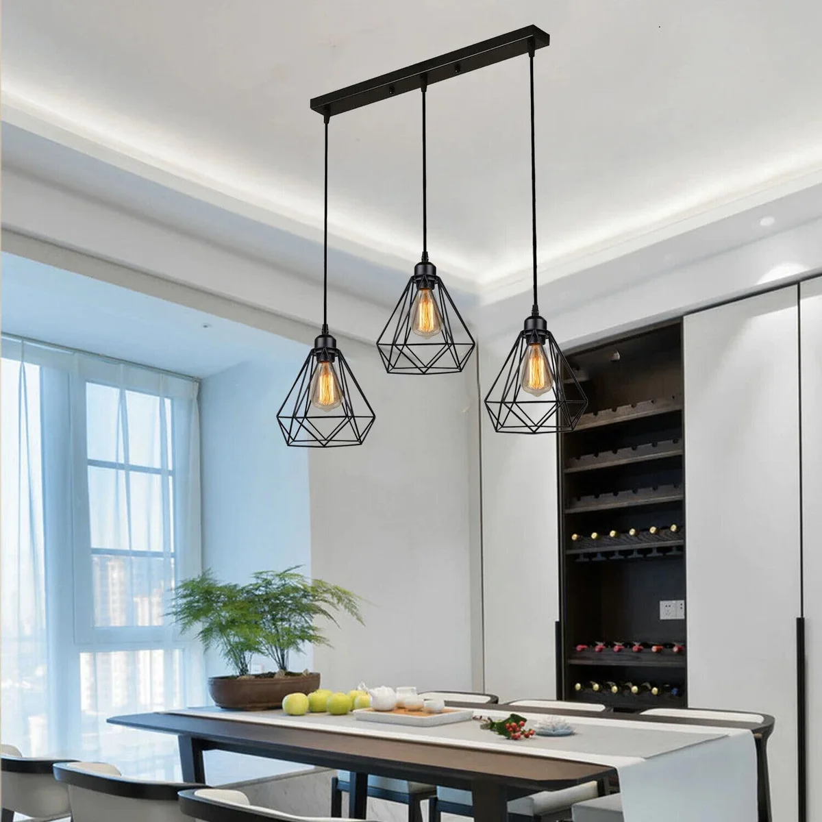 Black industrial 3-way ceiling pendant with adjustable cords and metal wire cage light fixtures hanging from rectangular rose