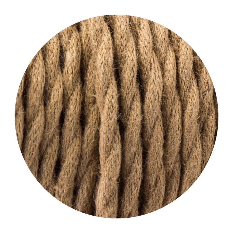 Coiled vintage twisted hemp cloth covered indoor lighting cable in natural brown tones on white background