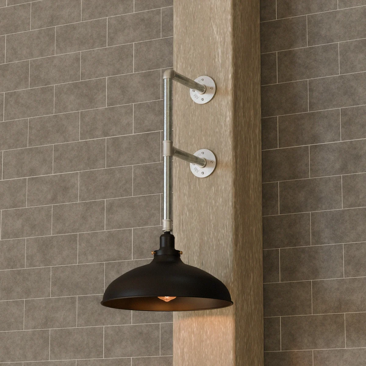 Industrial style wall lamp with dual flange pipe design, matte black dome shade, and galvanized metal finish mounted on wall