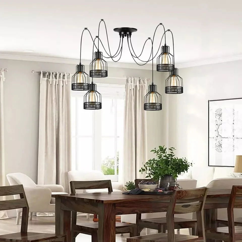Black industrial multi arm ceiling light with adjustable metal cage arms and exposed Edison bulbs hanging from ceiling mount