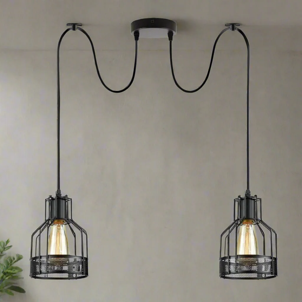 Black adjustable spider pendant light with five metal cage arms and exposed Edison bulbs hanging from ceiling mount