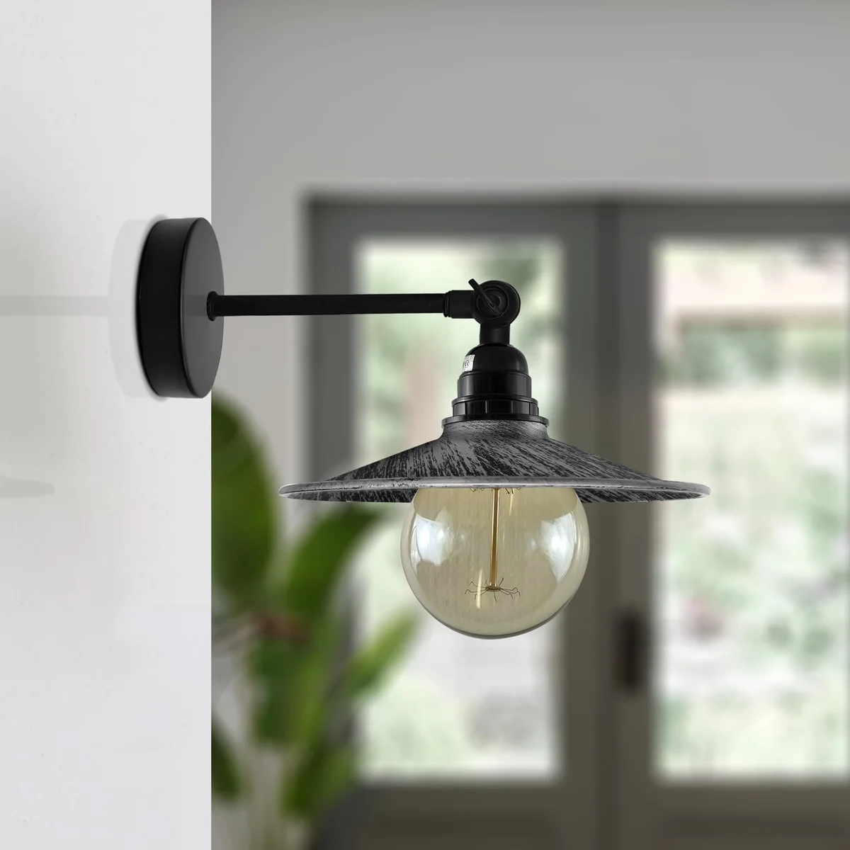 Industrial wall light with flat metal shade and adjustable arm, suitable for indoor wall mounting, vintage style