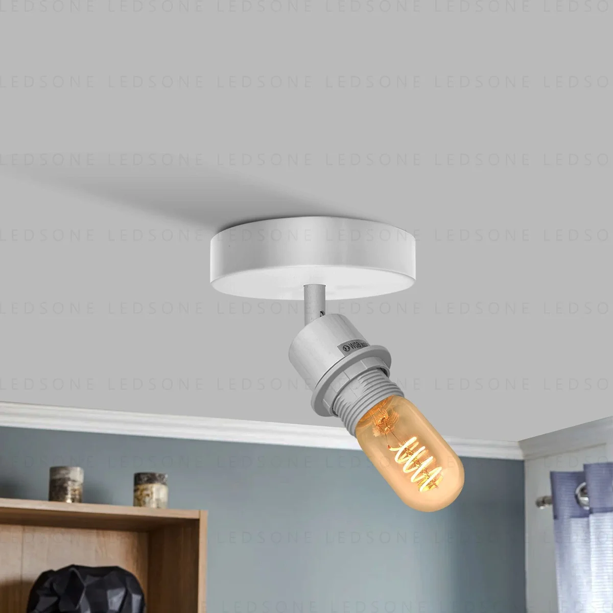 Adjustable industrial style wall light with 180° rotatable arm and metal finish, shown mounted on a white wall.