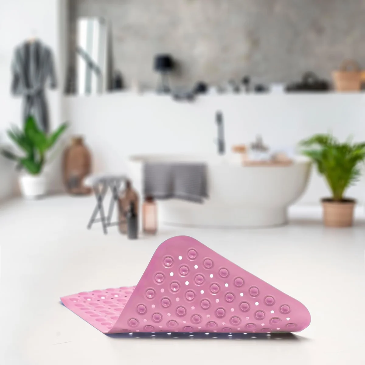 Blue non slip shower mat with suction cups, raised bubbles, and drainage holes for safe, quick-drying bath use