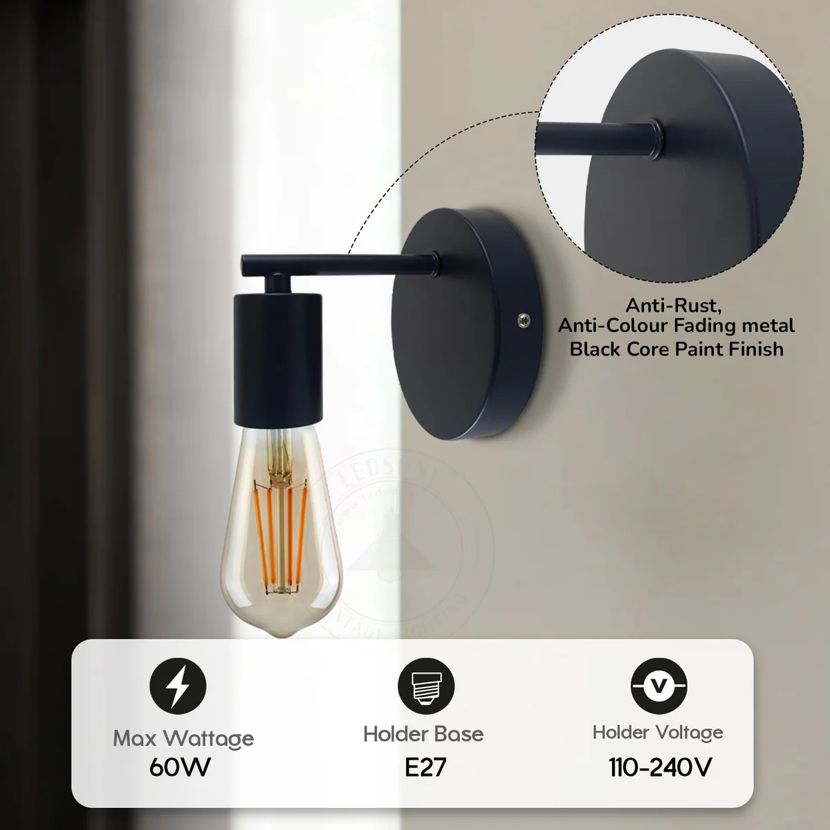 Black metal wall lamp with industrial design, black finish, white interior hood, and E27 bulb socket on metal arm
