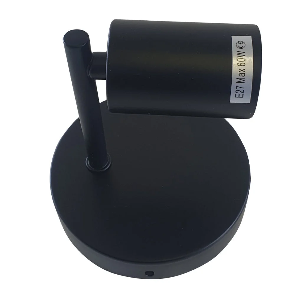 Black metal retro wall lighting sconce with white interior hood and E27 lamp base mounted on a wall in industrial style