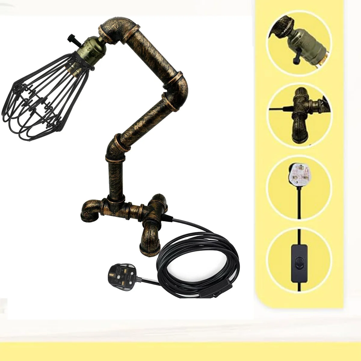 Steampunk water pipe industrial style lamp with metal cage and vintage Edison bulb on wooden desk background