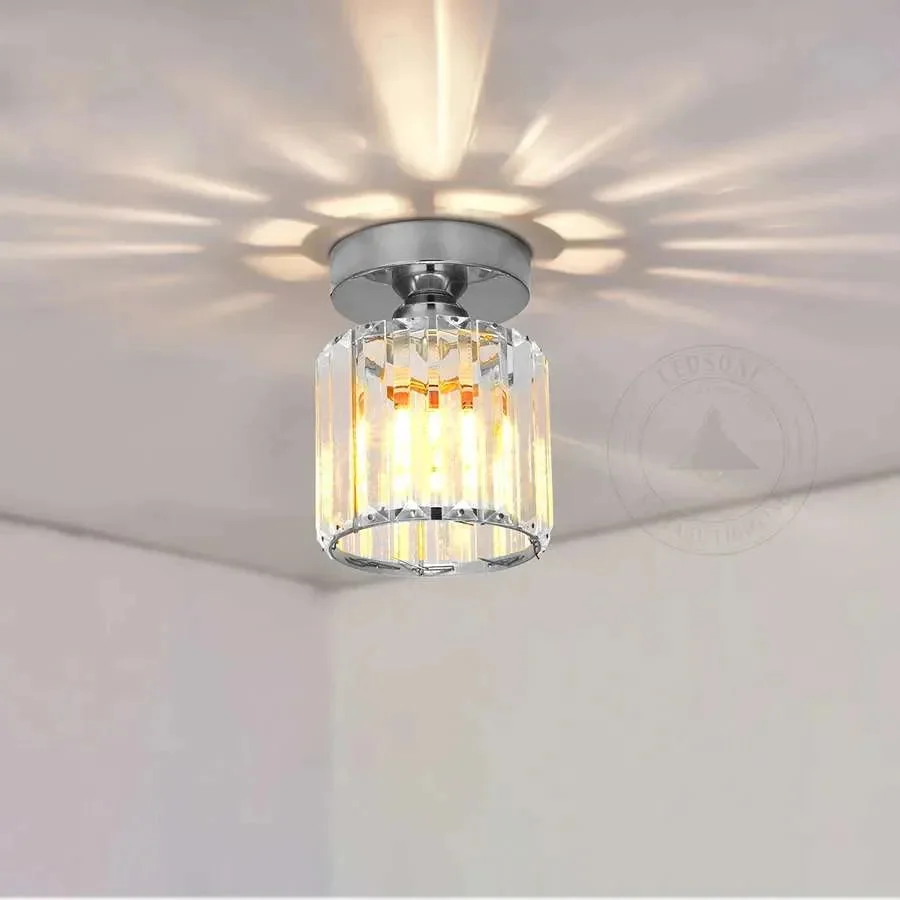 Art Deco brass and clear glass energy efficient ceiling lamp with round crystal design and dimmable LED technology