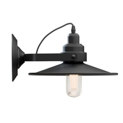 Adjustable swing arm wall light with flat metal shade mounted on a wall, showing sleek industrial design and adjustable arm