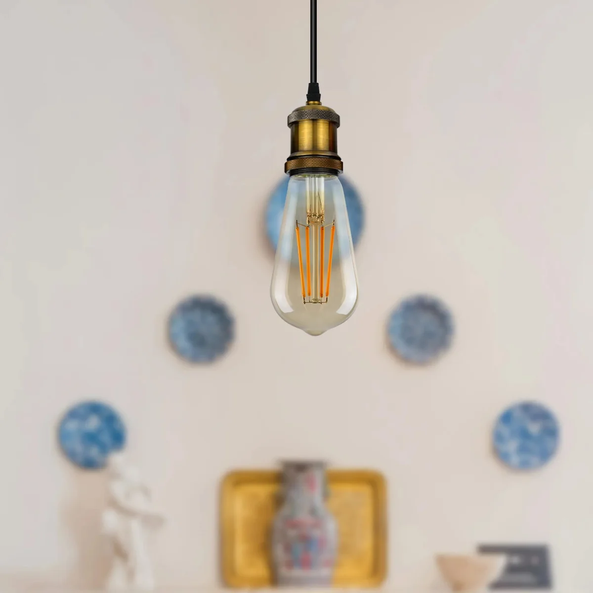 Industrial brass E27 pendant lamp with vintage Edison fitting and adjustable PVC cable hanging from ceiling rose