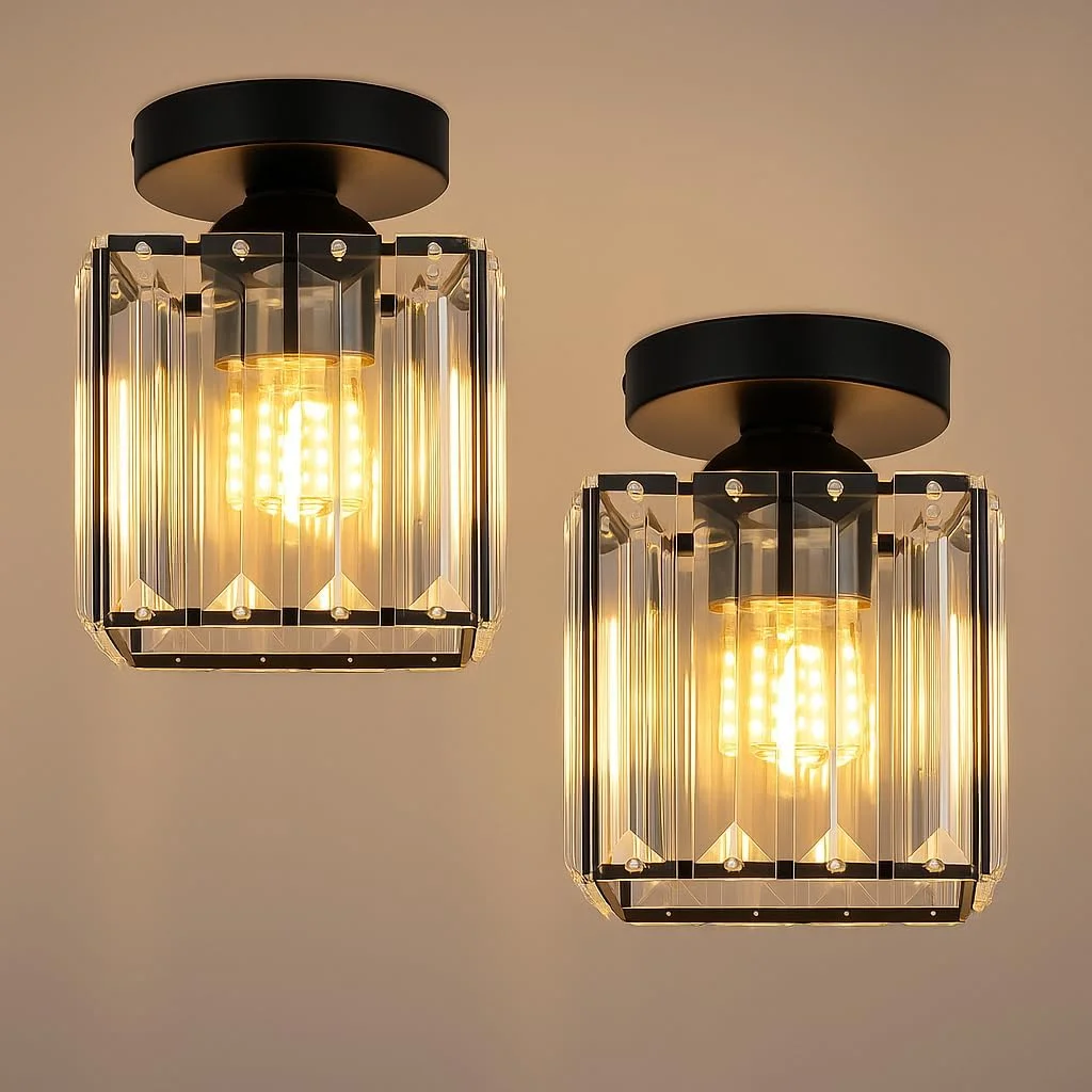 Two small square crystal ceiling lights with metal cage design mounted flush on a white ceiling