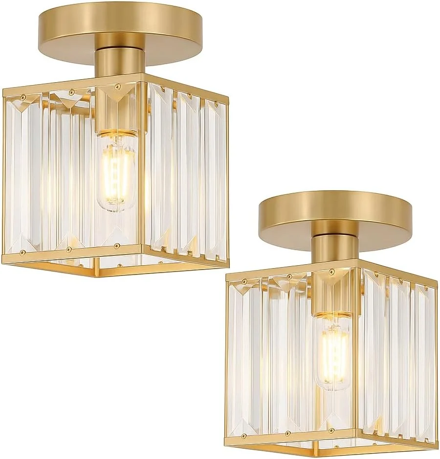 Two small square crystal ceiling lights with metal cage design mounted flush on a white ceiling
