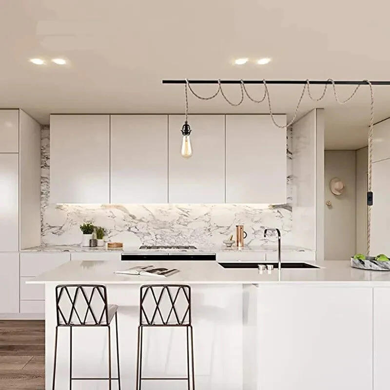 Twisted hemp rope pendant light with UK plug and E27 fitting hanging against a white background