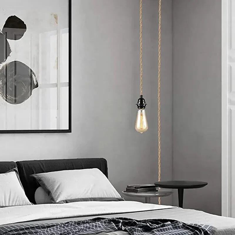 Twisted hemp rope pendant light with UK plug and E27 fitting, showing natural textured cord and metal fixture details
