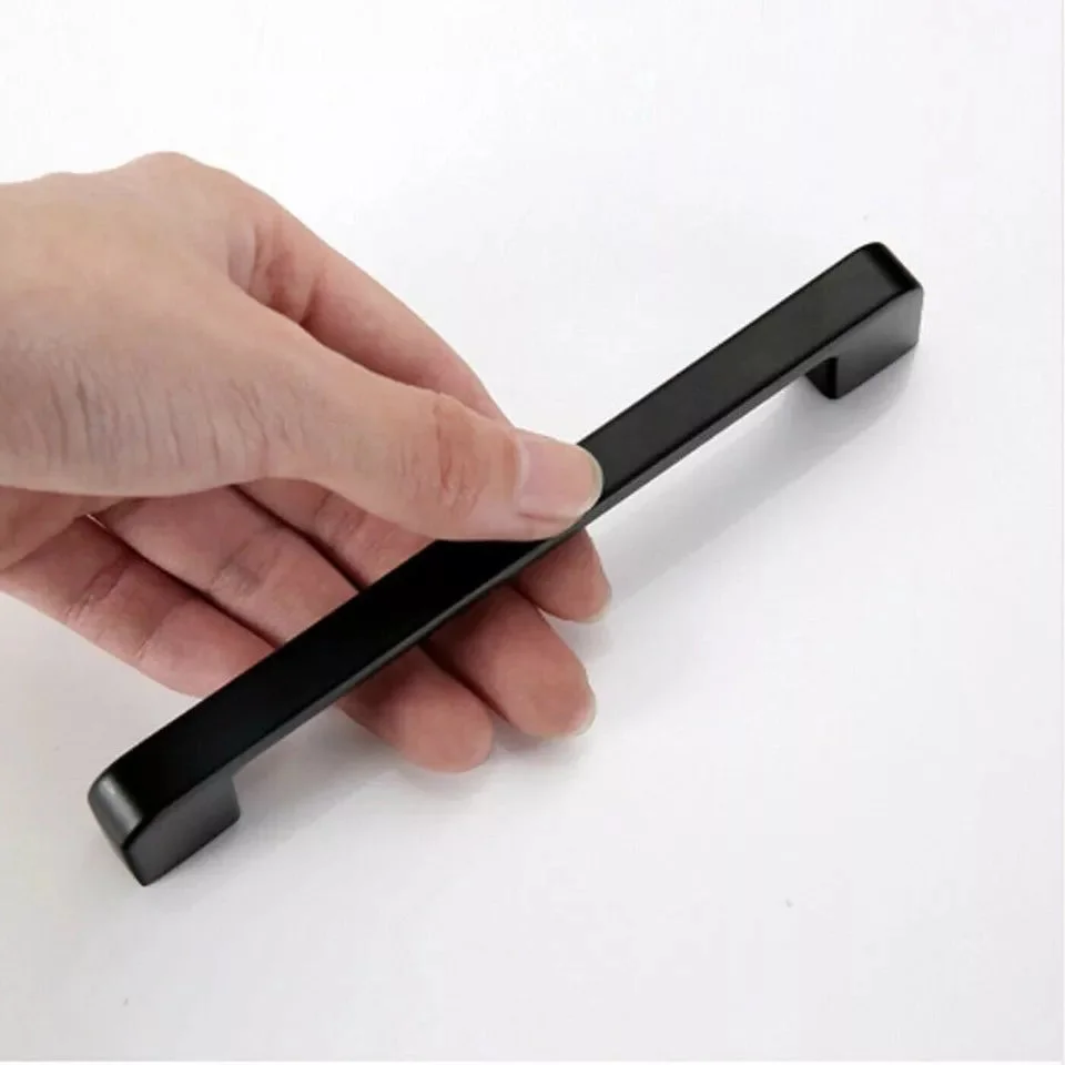 Sleek matte black cabinet door handle with clean lines, metal vintage style, suitable for kitchen or bathroom cupboards