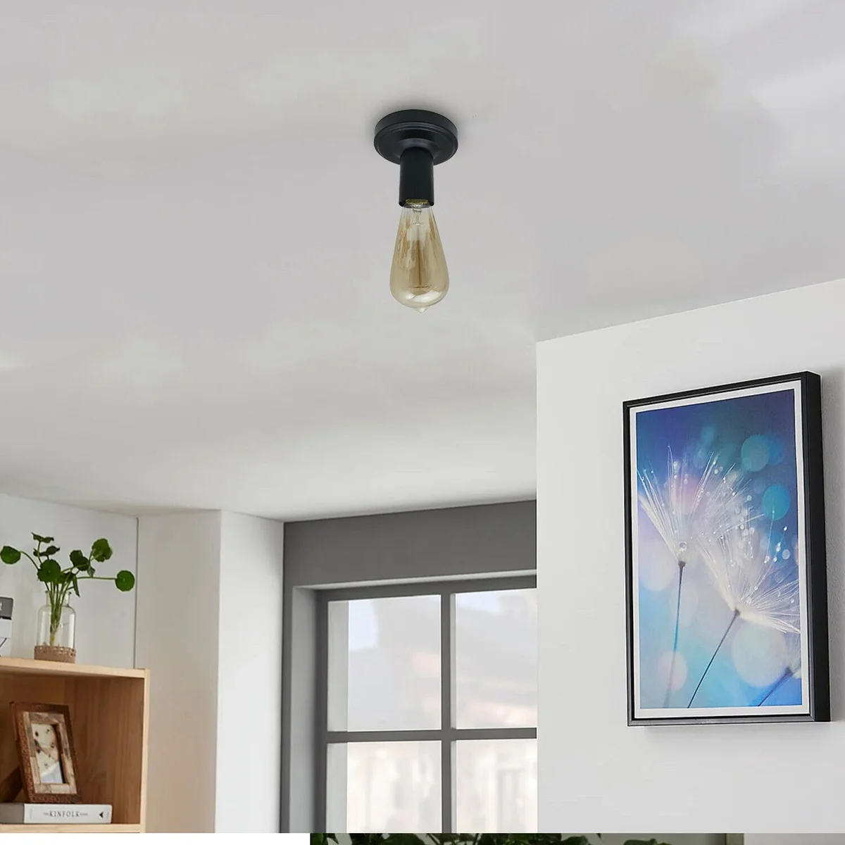 Black metal ceiling lamp with E27 light bulb holder and round ceiling plate, suitable for vintage bulbs, 10.8cm diameter.