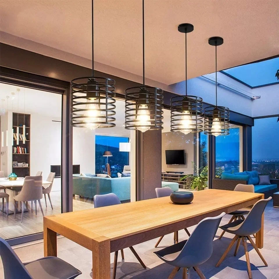 Black metal pendant light with industrial wire cage design, ceiling-mounted, featuring a single E27 bulb socket.