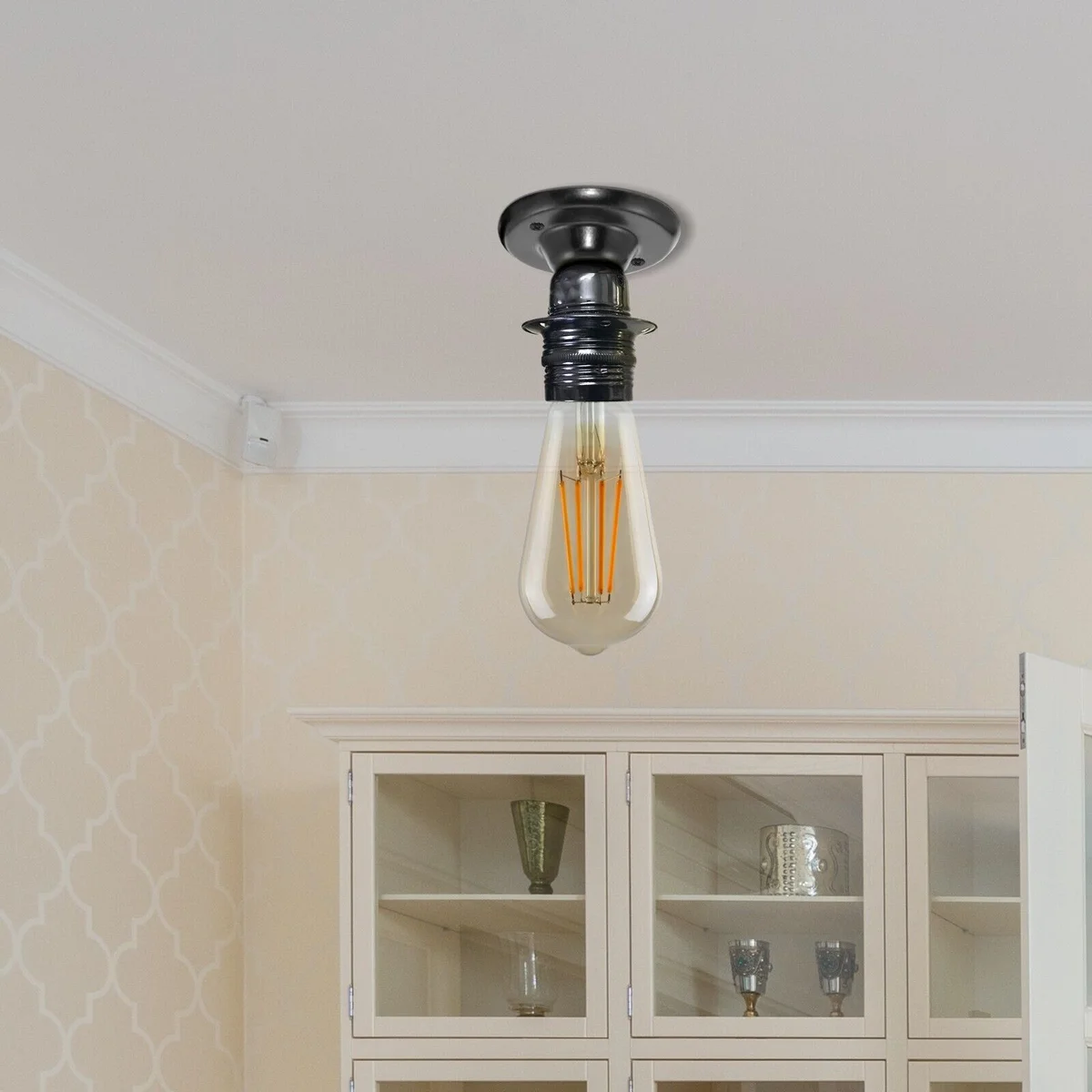 Vintage style metal light fitting E27 lamp bulb holder with exposed filament socket in industrial design