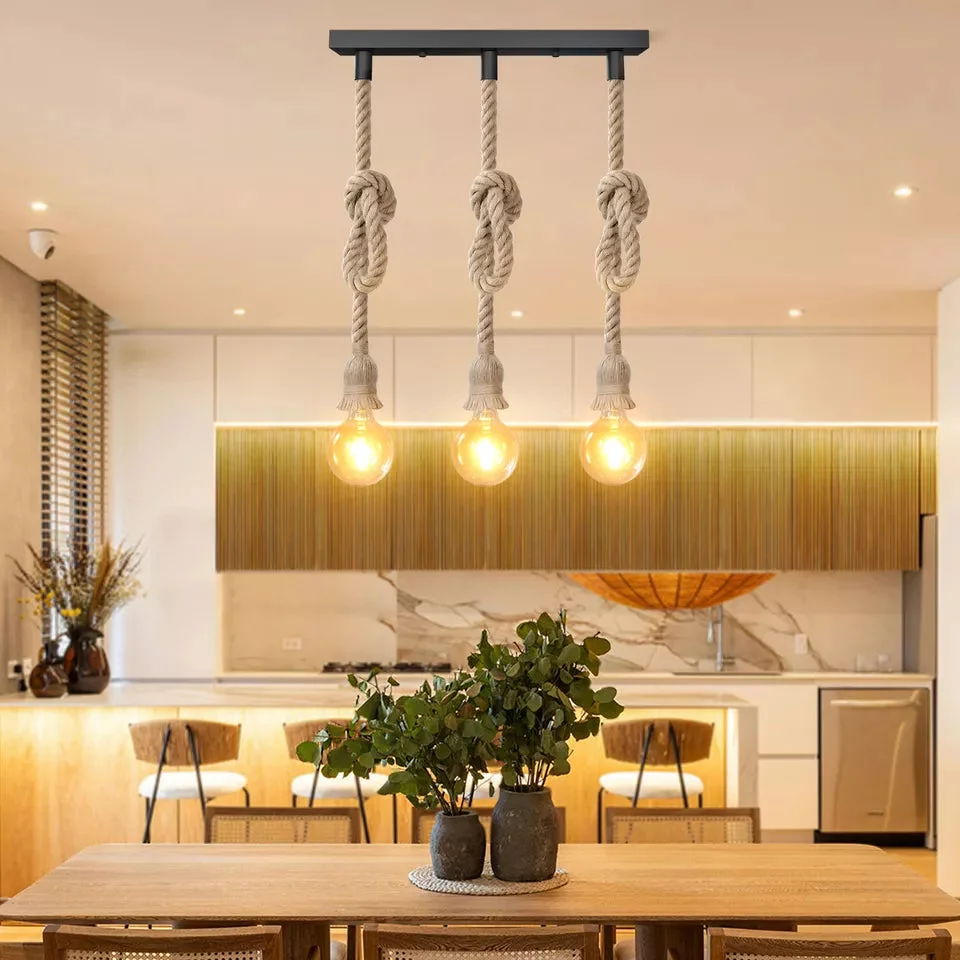 Three head hemp rope ceiling light with natural brown hemp rope and black metal fittings hanging from ceiling rose