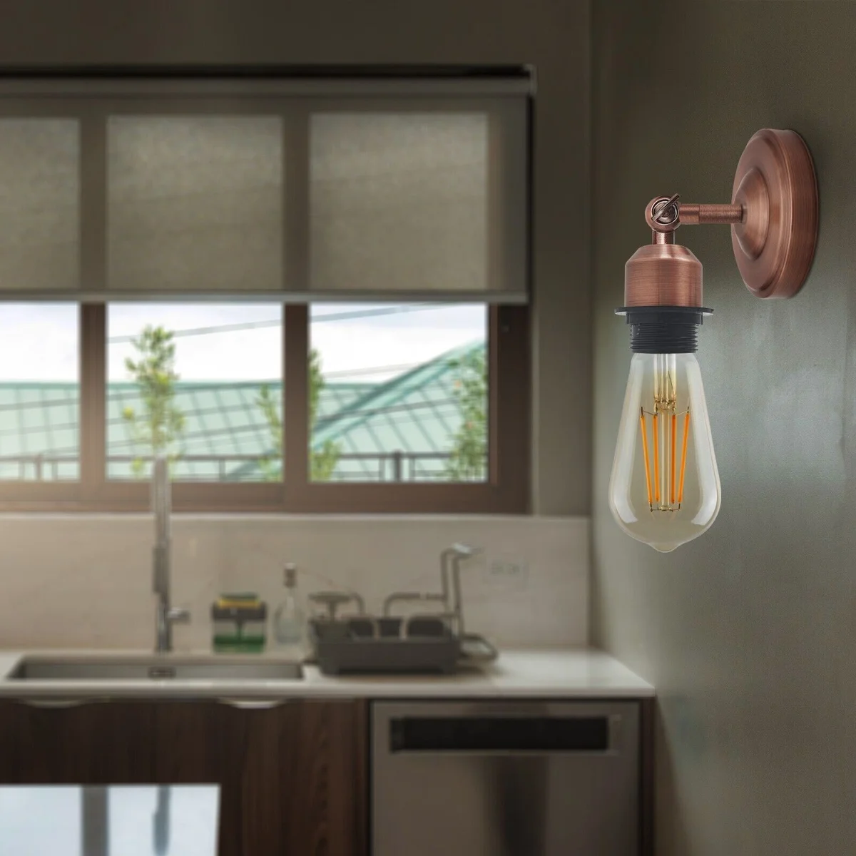 Vintage industrial wall sconce in black metal with adjustable arm mounted on white wall, E27 bulb base visible