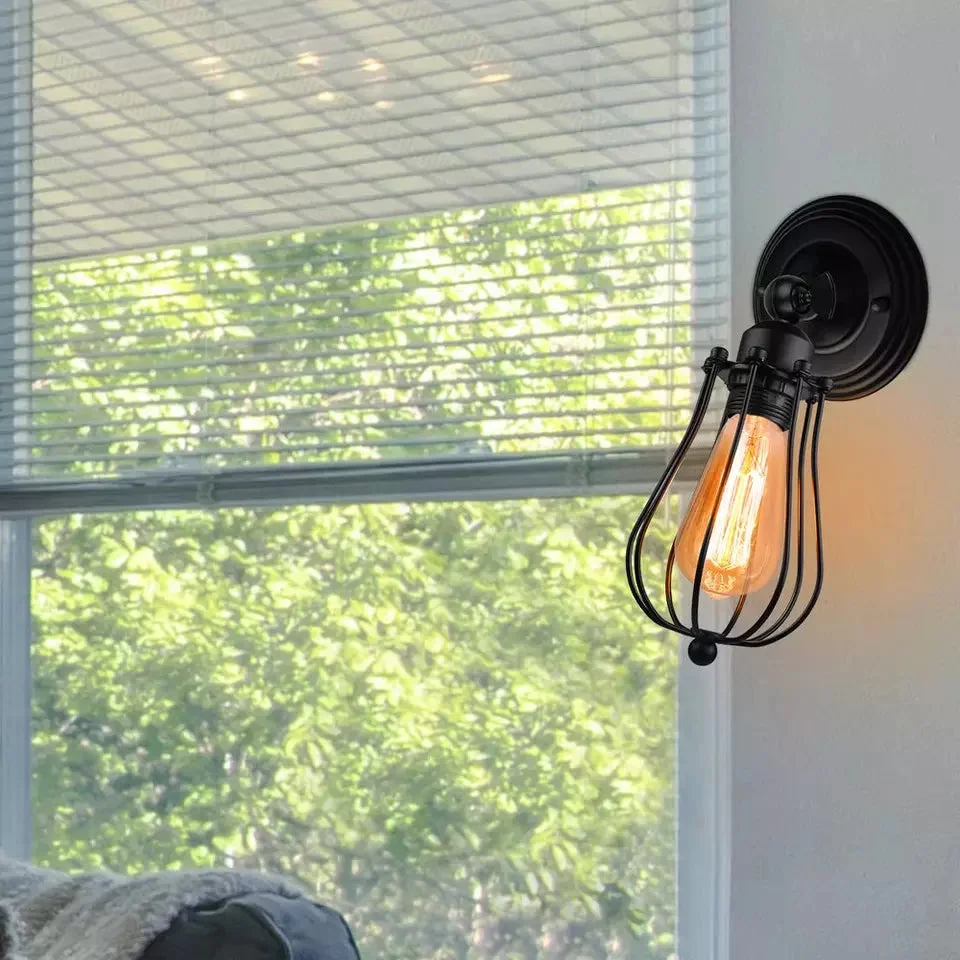 Black industrial wall light with metal cage design, dimmable, suitable for living rooms and bedrooms, E27 bulb base.