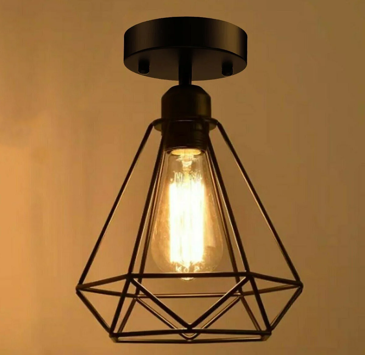 Black vintage metal cage ceiling lamp flush mounted with open bottom cage design and black ceiling plate