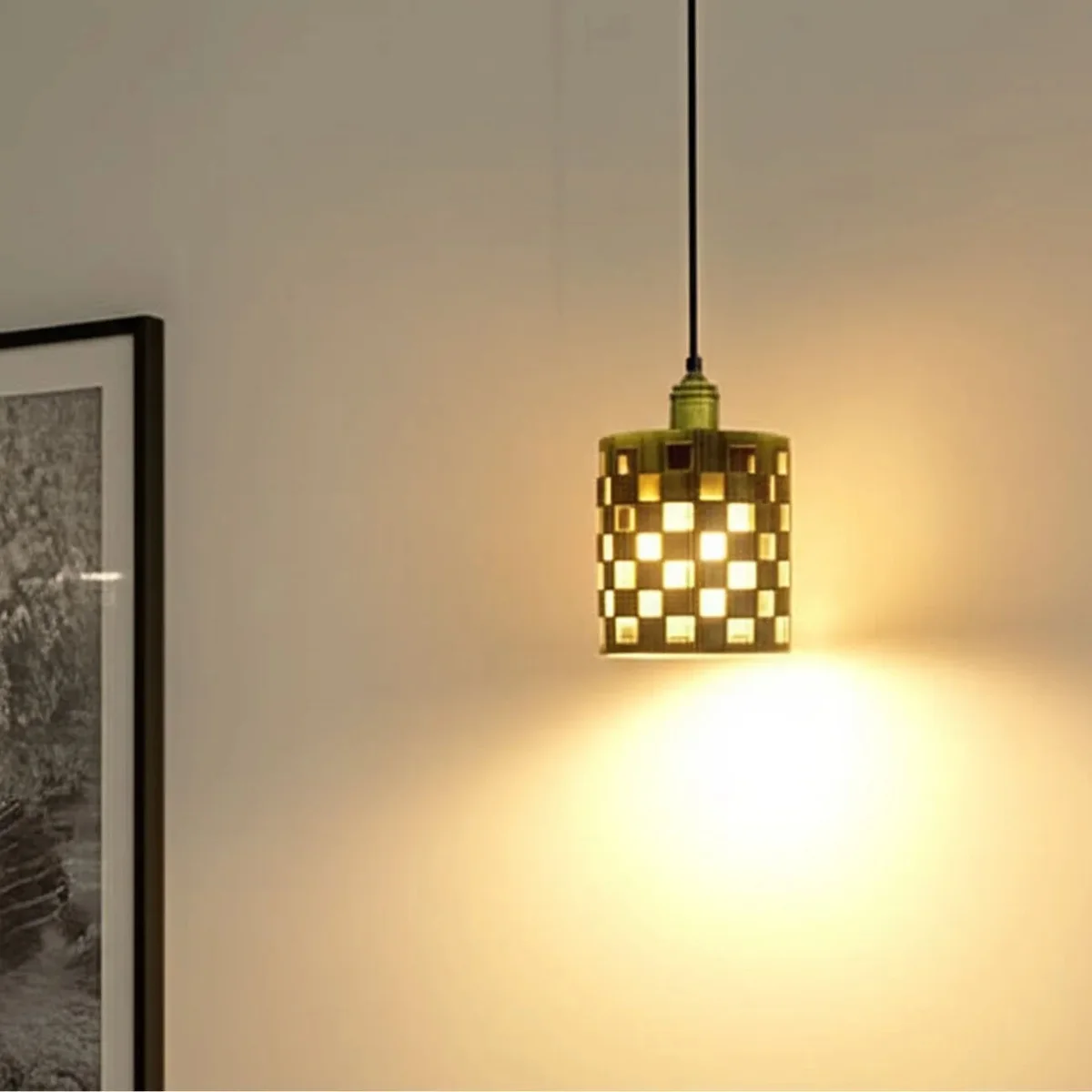 Elegant brass pendant light with brushed finish, pendant lights for kitchen island, metal shade, simple installation.