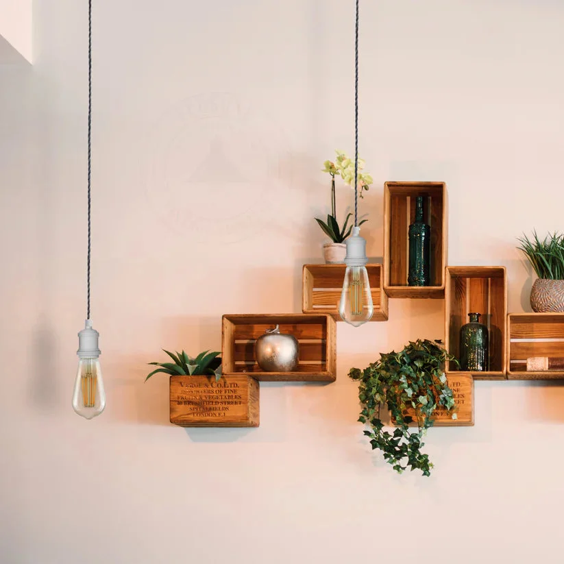 Black white pendant light with twisted fabric cable, white E27 holder, and matching ceiling rose against a white background