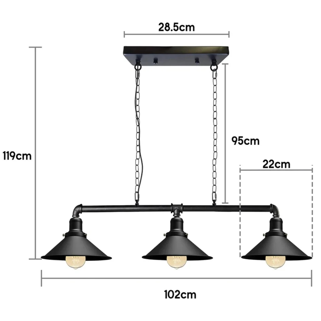 Bold industrial pendant light with metal pipe frame and three scone cup lamps, hanging low over kitchen island.