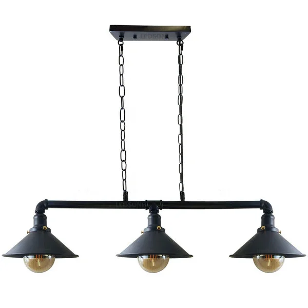 Steampunk ceiling light with three scone cup lamps on black metal pipe, rustic industrial design hanging over kitchen island