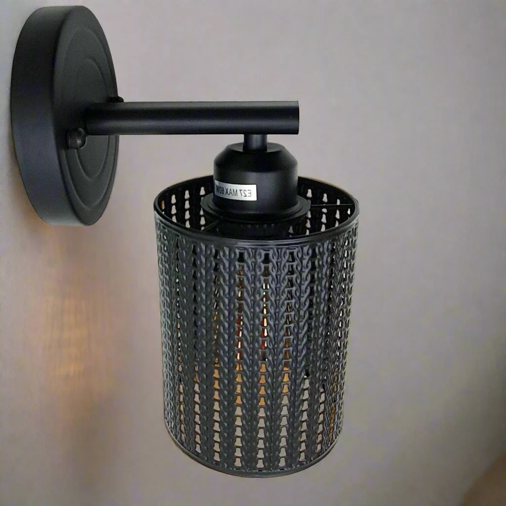 Modern industrial wall lamp with retro wire cage design, metal shade, and E27 bulb holder on a wall mount
