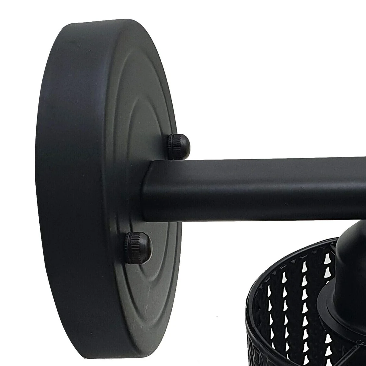 Modern industrial style lighting wire cage wall lamp with metal shade and E27 bulb holder mounted on a wall