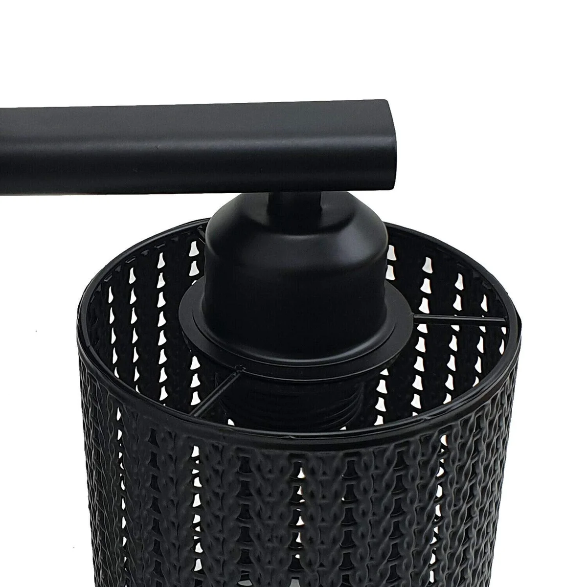 Modern industrial wall lamp with metal wire cage shade and E27 bulb holder mounted on a wall bracket