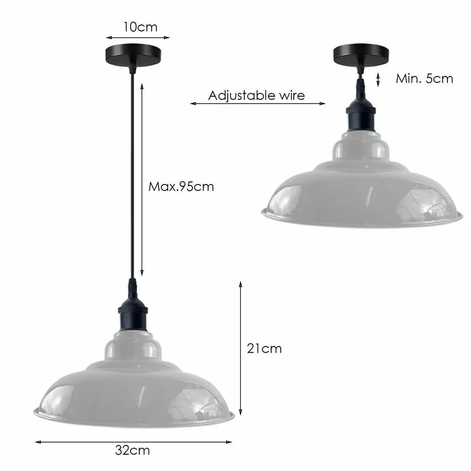 Red vintage industrial metal pendant light with dome shade and adjustable angled base hanging on white background