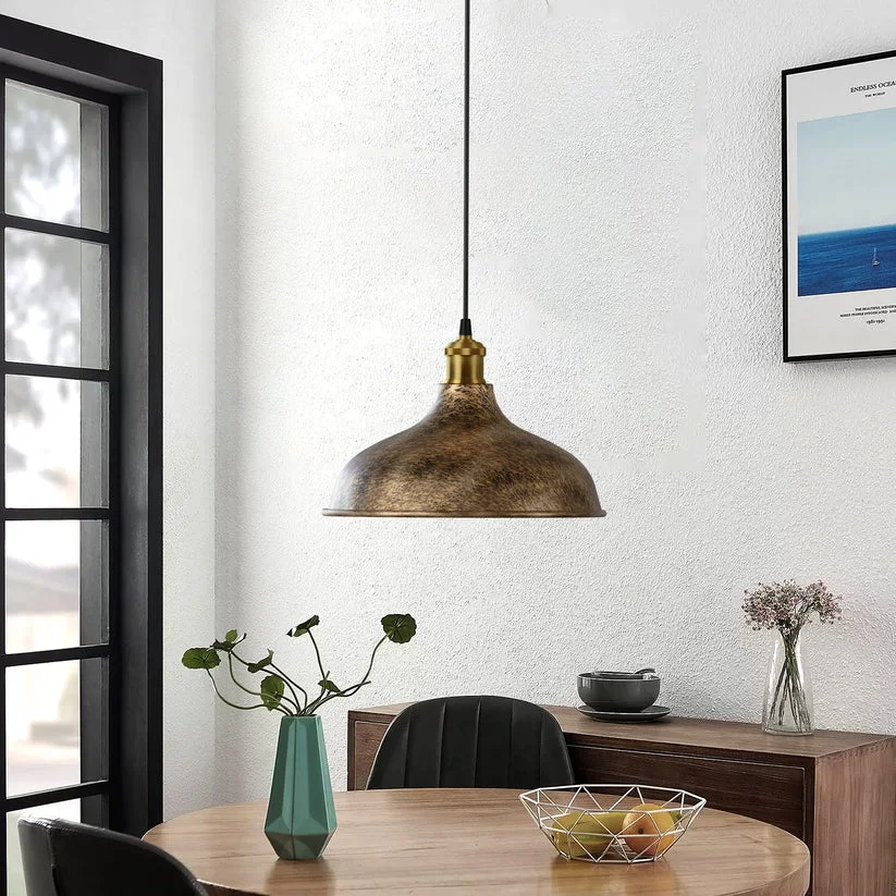 Vintage brushed copper shade E27 bulb pendant light with matte black curved design hanging from ceiling rose