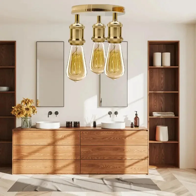 Modern ceiling light with three French gold iron Edison-style filament bulb holders in semi flush mount design