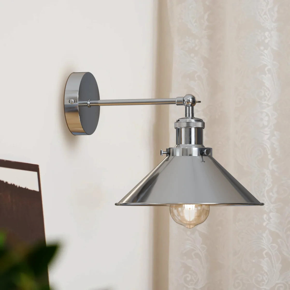 Industrial wall lamp with satin nickel cone shade, metal frame, adjustable arm, 22cm diameter, 10cm tall for living rooms.