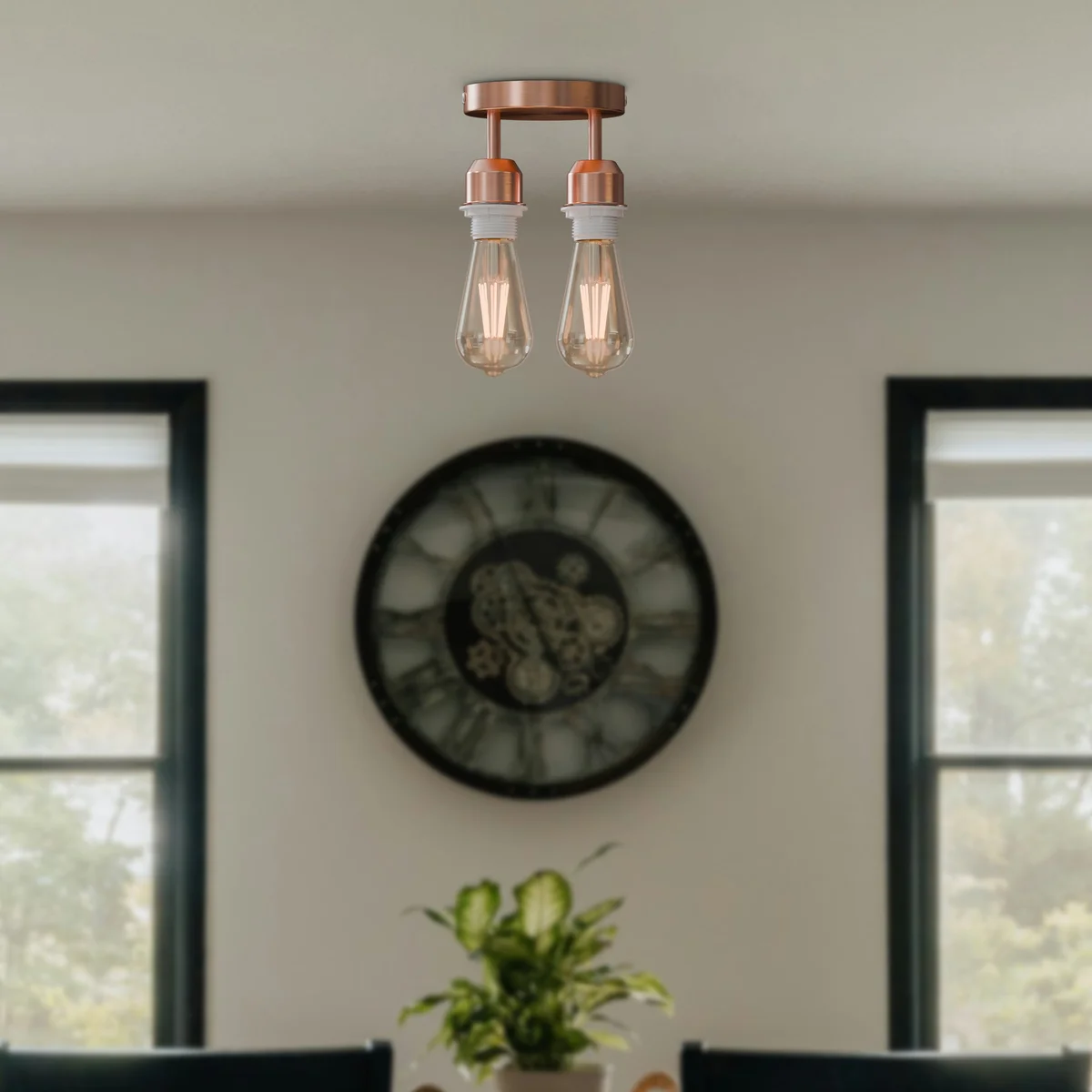 Modern industrial 2 way ceiling light with circular metal rose and twin E27 lamp holders, shown installed on ceiling