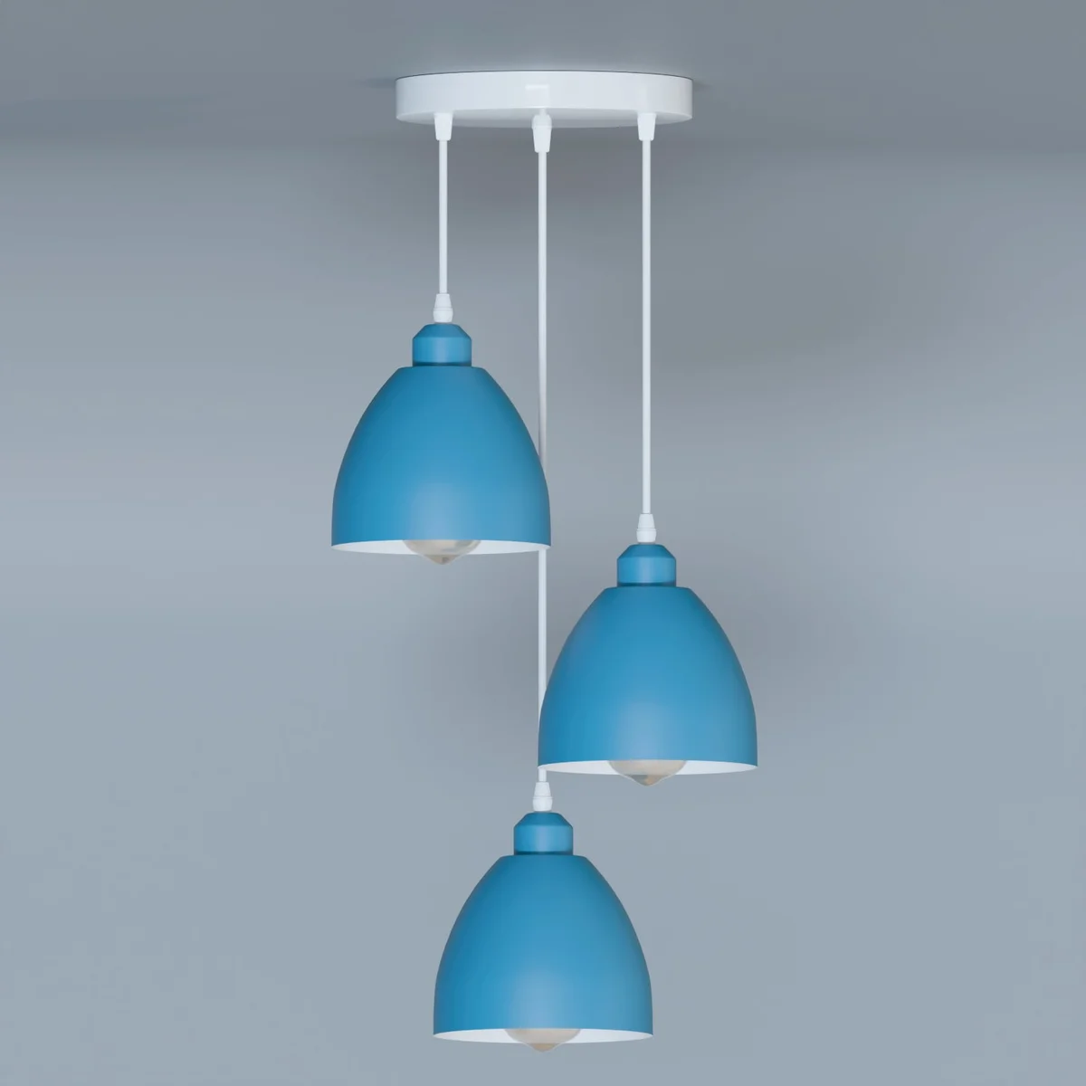 Industrial pendant light with three adjustable metal shades hanging from ceiling rose with long cables in industrial style