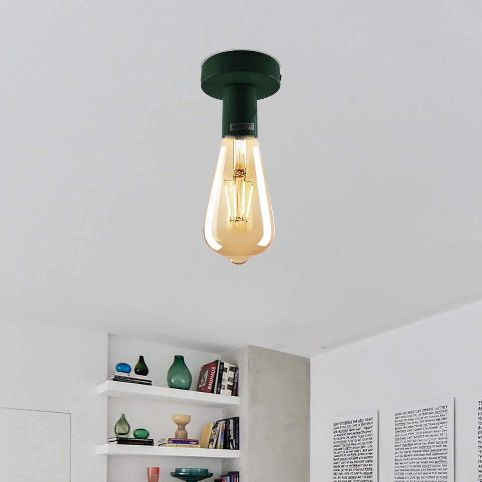 Edison screw socket in gold metal, 8 cm long, 4 cm base, fitted into a clear glass bulb holder.