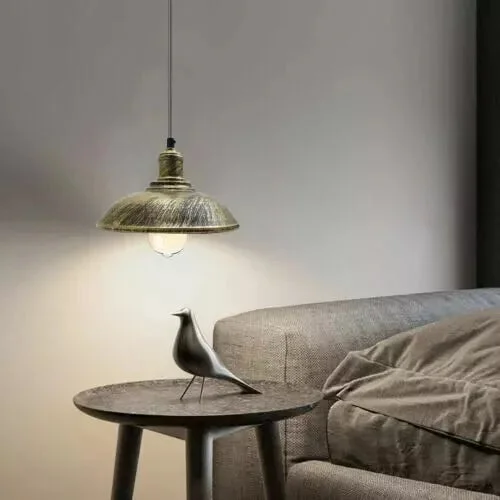 Brushed brass metal ceiling light with vintage conical lampshade and 95 cm adjustable flex cable hanging from ceiling canopy